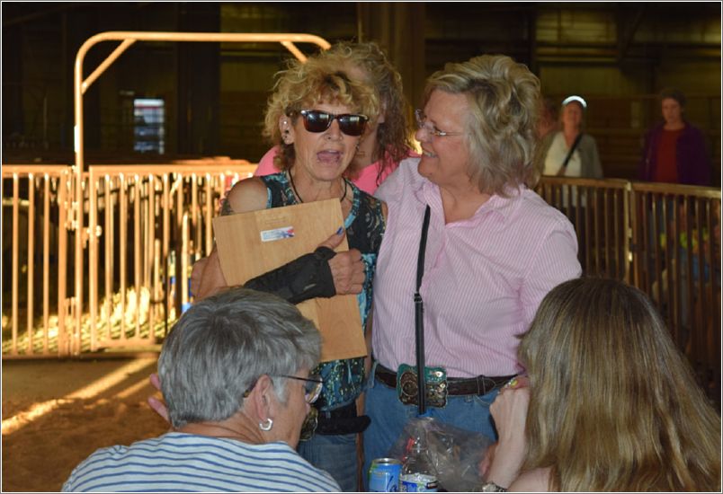 Just before the Spinners Lead, Maria Rooney (left) received NCWGAs Lifetime Achievement Award from Ann Robinson, the organizations treasurer. Photo: Peggy Lundquist.